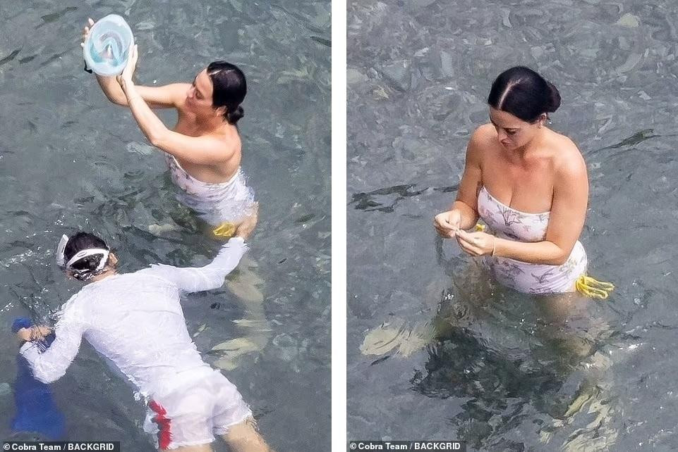 Suốt cả ngày đi chơi, Katy và Orlando gần như quấn quýt không rời.