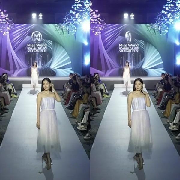 Nam Em vuốt tóc tạo dáng ở cuối đường catwalk Nam Em vuốt tóc tạo dáng ở cuối đường catwalk