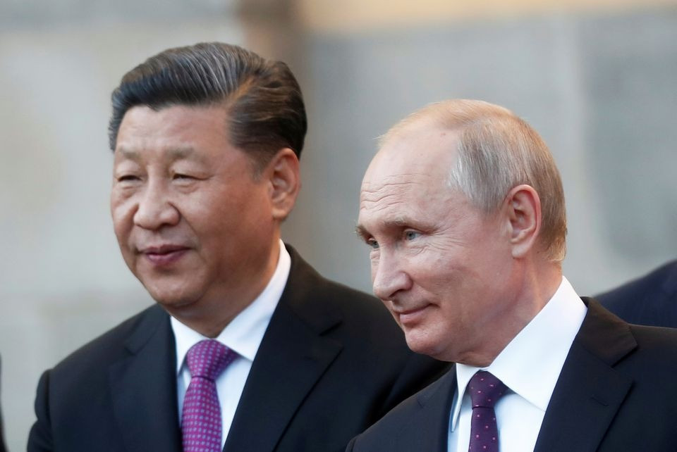 Tổng thống Nga Vladimir Putin và Chủ tịch Trung Quốc Tập Cận Bình. Ảnh: Reuters