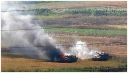 Xe Merkava bị bắn cháy trên chiến trường. Xe Merkava bị bắn cháy trên chiến trường