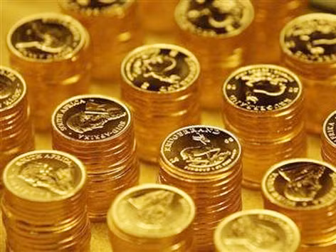 Các chuyên gia nhận định vàng có thể tiếp tục giảm về 1.100 USD/Oz. Ảnh: Reuters