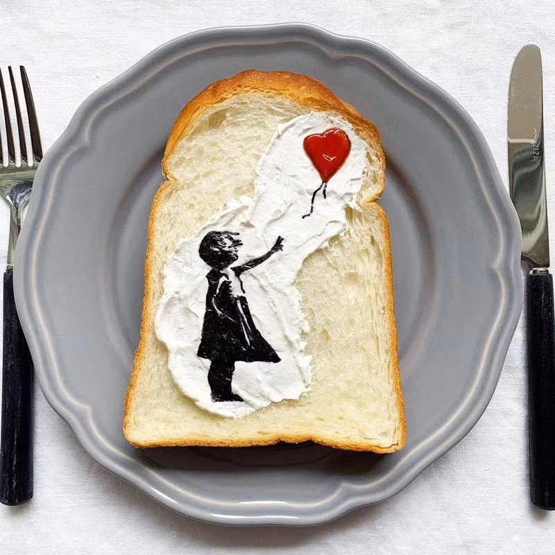 Eiko họa lại bức tranh nổi tiếng của Banksy trên bánh mì