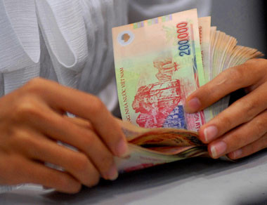 Lãi suất huy động giảm về 9%/năm