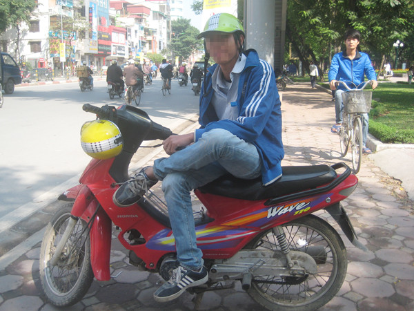 Phan Văn Thịnh - cử nhân CNTT làm xe ôm Ảnh: D.N