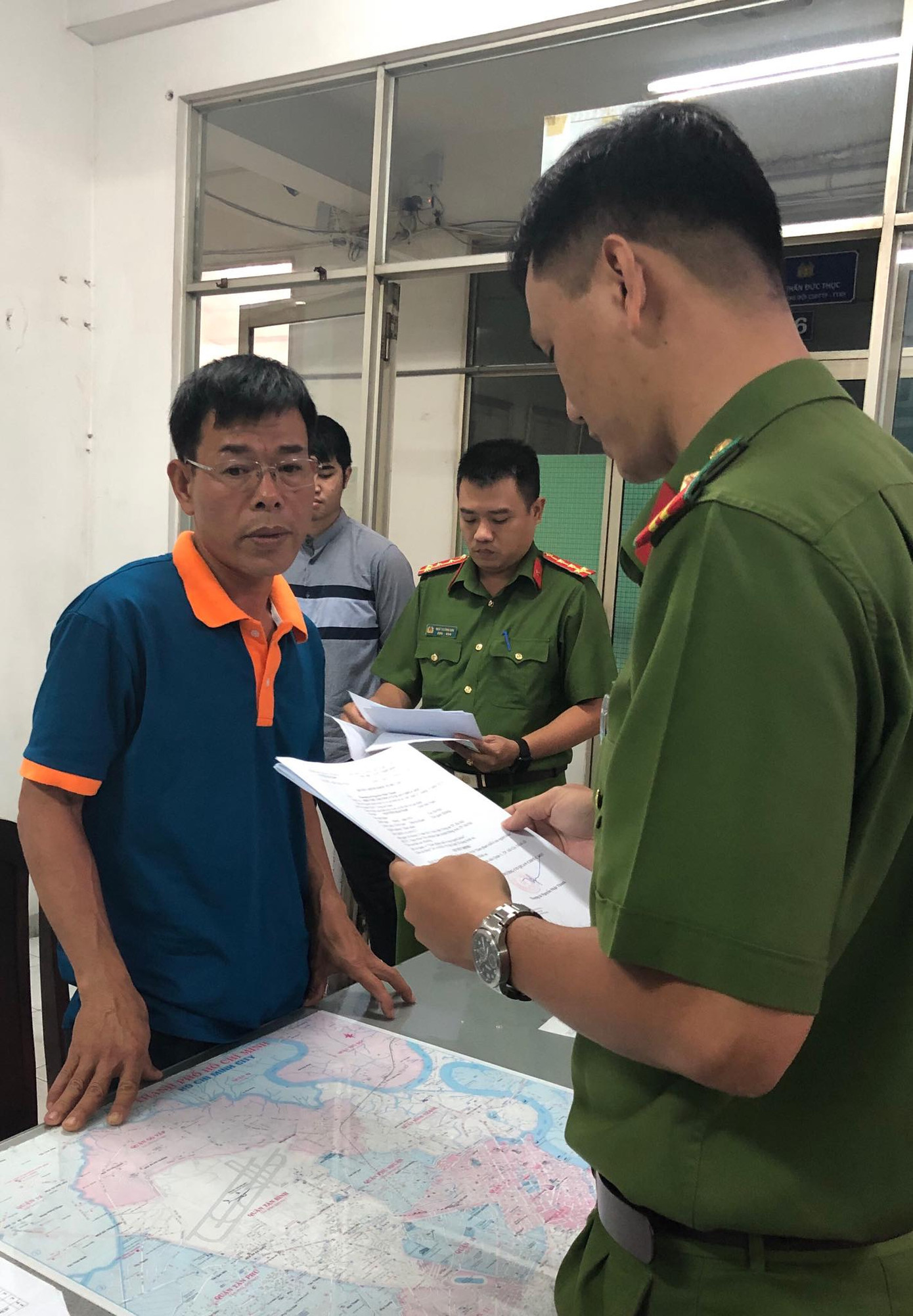 Khám xét nơi làm việc của Phó chánh án quận 4 Nguyễn Hải Nam ảnh 1