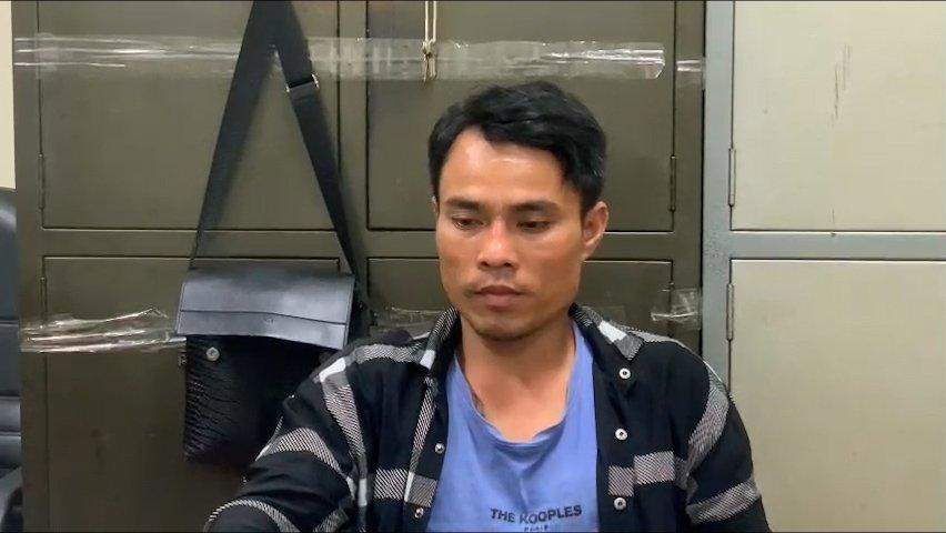 Nghi can Đoàn Minh Hải khi làm việc với công an. Ảnh do công an cung cấp.