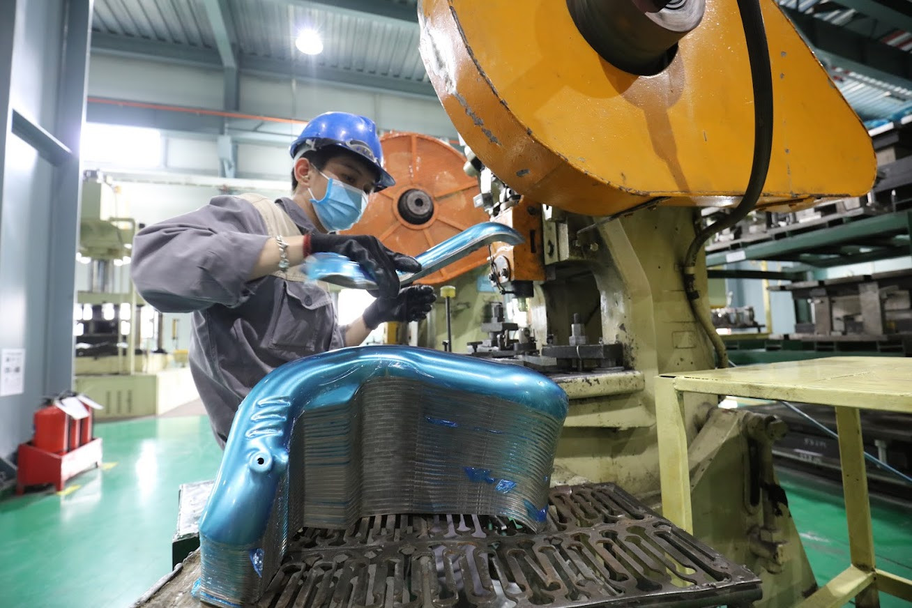 Nhiều doanh nghiệp Việt đã tham gia sâu vào chuỗi cung ứng, sản xuất thiết bị ô tô của các doanh nghiệp FDI. Ảnh: Như Ý