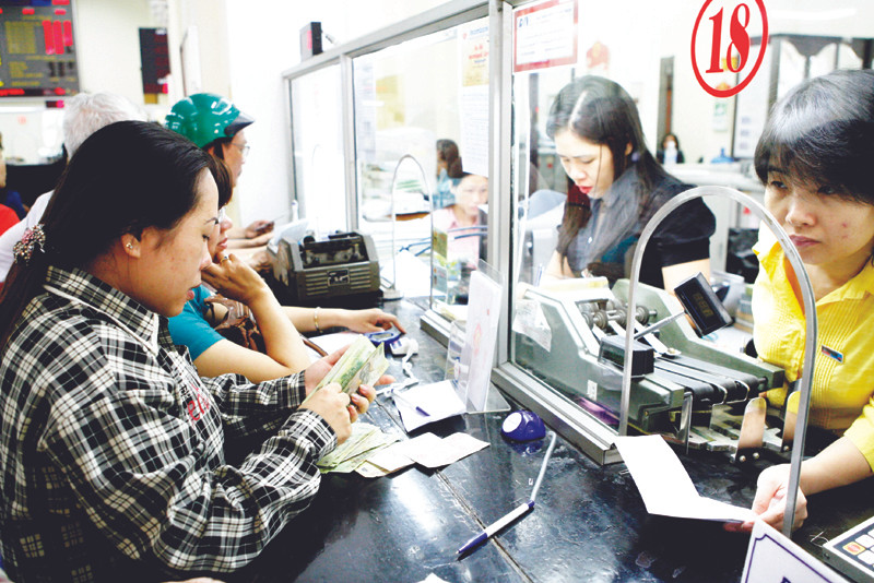 Tái cấu trúc hệ thống ngân hàng là một trong những nhiệm vụ cần thực hiện trong thời gian tới. Ảnh minh họa: Hồng Vĩnh. Tái cấu trúc hệ thống ngân hàng là một trong những nhiệm vụ cần thực hiện trong thời gian tới. Ảnh minh họa: Hồng Vĩnh