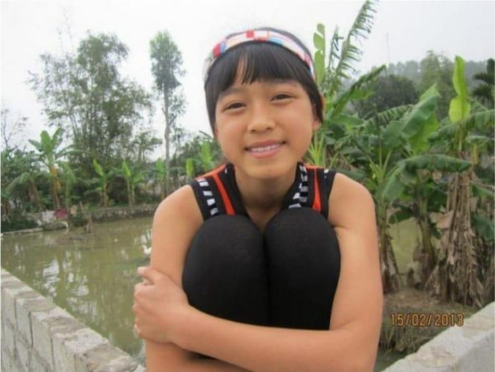 Nụ cười hồn nhiên của Đỗ Thị Hà ngày nhỏ.
