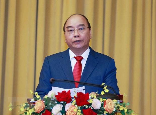 Chủ tịch nước Nguyễn Xuân Phúc giao nhiệm vụ cho Thượng tướng Phạm Hoài Nam, Thứ trưởng Bộ Quốc phòng. (Ảnh: Thống Nhất/TTXVN)