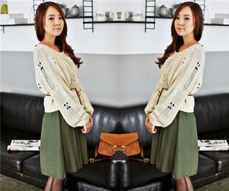 Áo len dáng chui bạn khoác ngoài váy khá lạ và thời trang