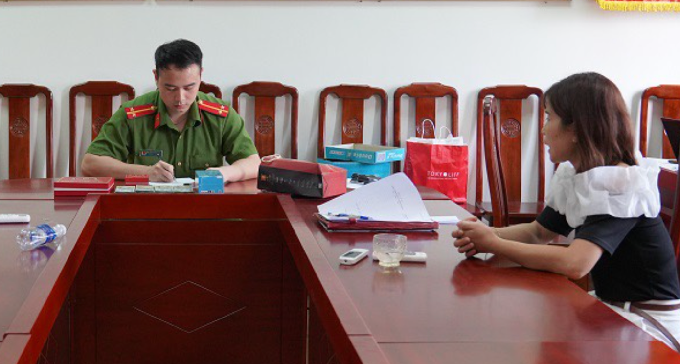 Lò Thị Huê tại cơ quan công an. Ảnh: CACC