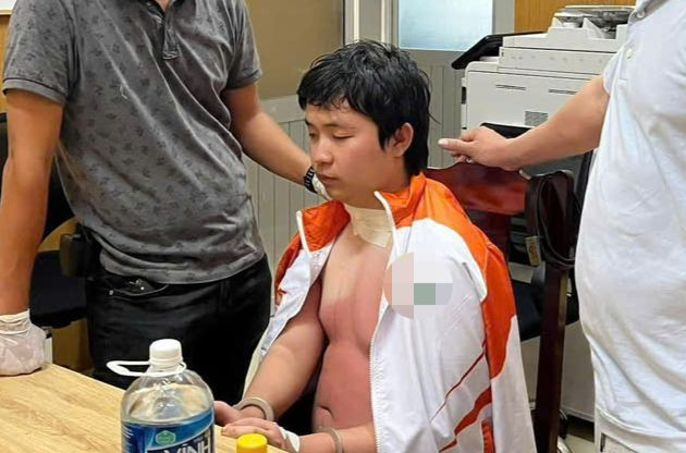 Nghi phạm Tuấn sau khi bị bắt giữ.