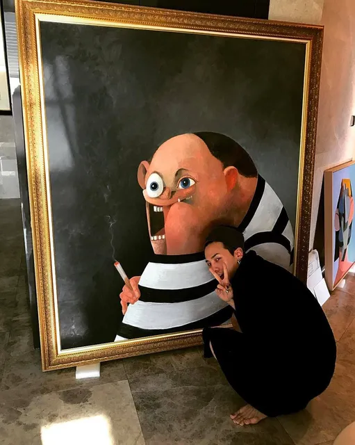 GD cùng tác phẩm "Big John" của George Condo (ước tính trị giá 985.000 đôla). Ngoài ra anh còn có một bộ bốn tác phẩm khác, trị giá khoảng 370.000 đôla.