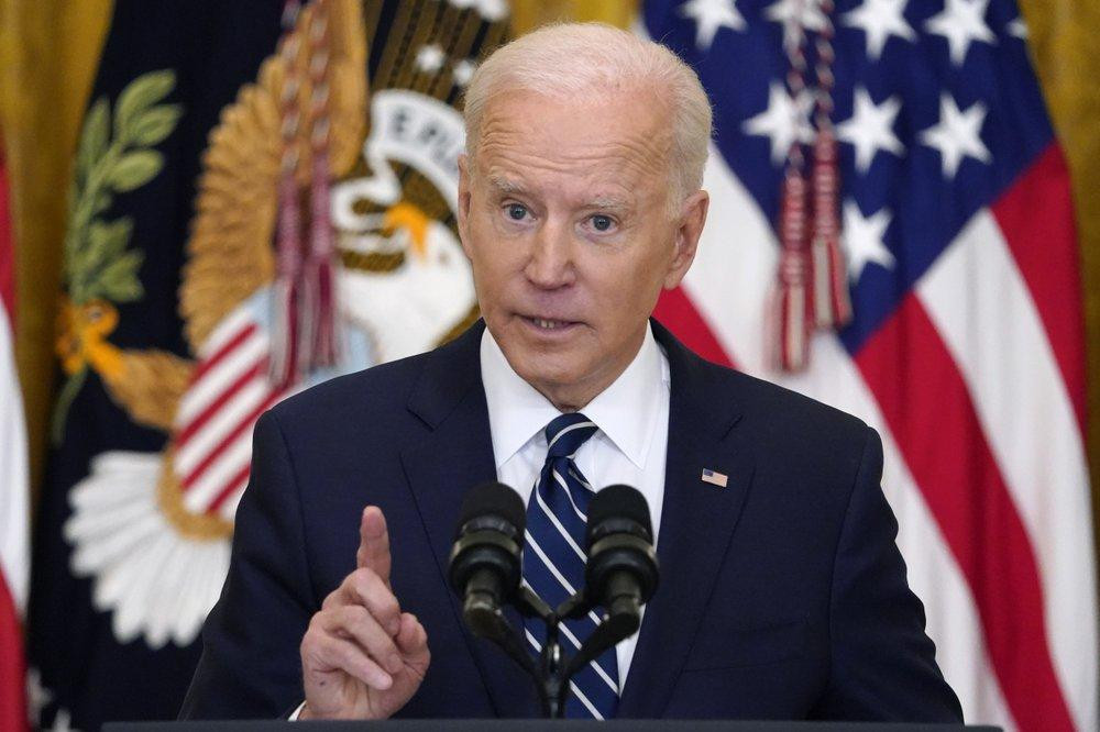 Ông Biden trả lời câu hỏi của phóng viên. Ảnh: AP Ông Biden trả lời câu hỏi của phóng viên. Ảnh: AP