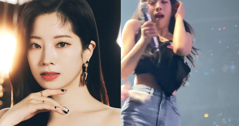 Dahyun giật mình vì bị ném đồ vật vào người.