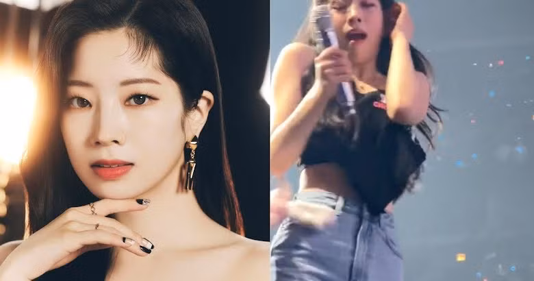 Dahyun giật mình vì bị ném đồ vật vào người.