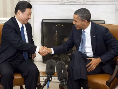 Tổng thống Mỹ Barack Obama gặp gỡ ông Tập Cận Bình (trái) khi ông Tập là Phó Chủ tịch Trung Quốc. Ảnh: Getty Images