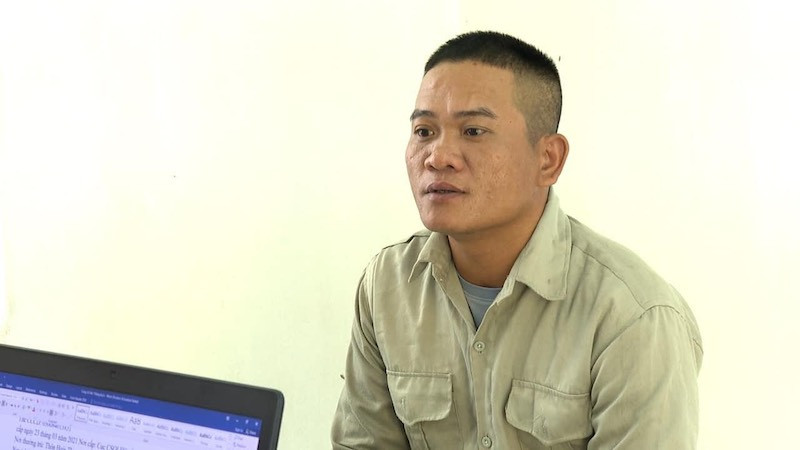 Lê Văn Thắng tại cơ quan công an.