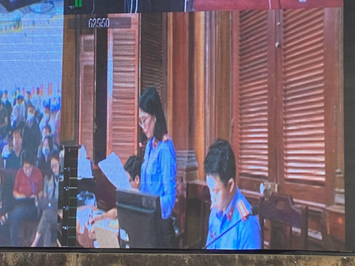 Đại diện Viện Kiểm sát tại phiên tòa. Ảnh chụp qua màn hình.