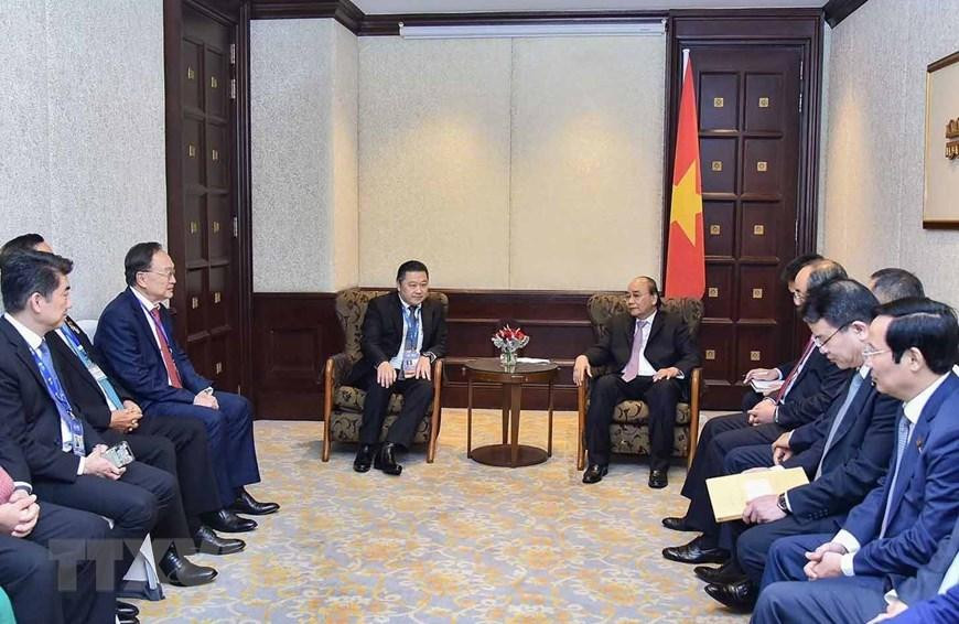 Chiều 17/11, tại thủ đô Bangkok (Thái Lan), Chủ tịch nước Nguyễn Xuân Phúc tiếp Chủ tịch Tập đoàn CP Dhanim Chearnont. (Ảnh: Thống Nhất/TTXVN)