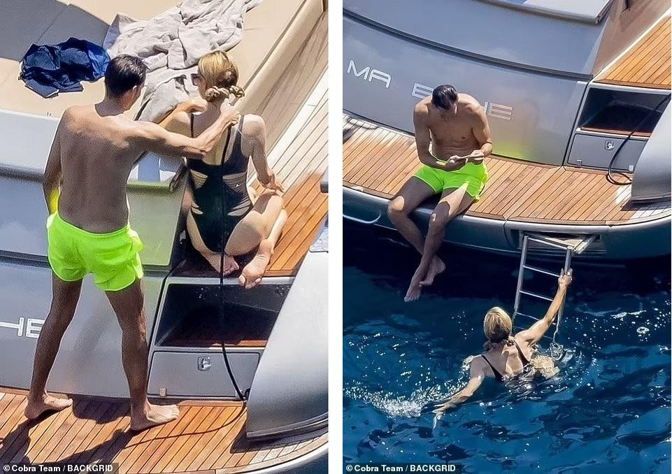 Carter Reum mặc chiếc quần bơi màu xanh neon để lộ thân hình cao lớn, rắn rỏi không kém bà xã bằng tuổi.