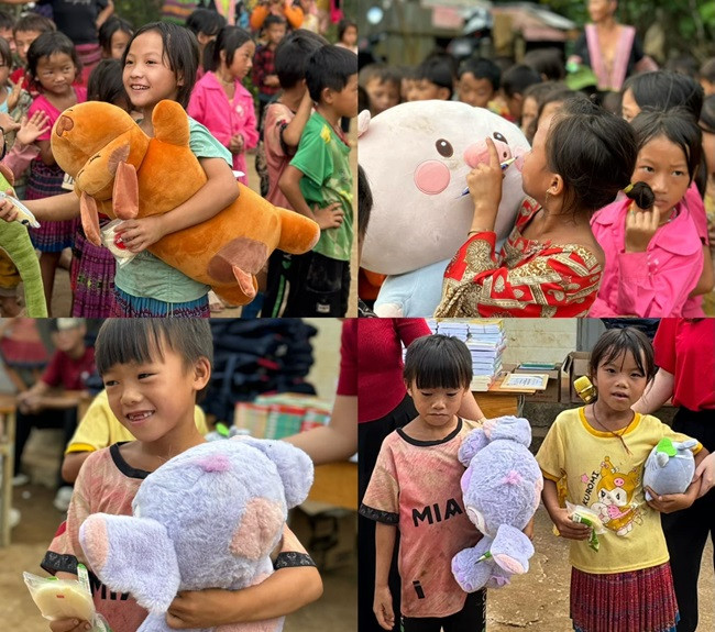 Niềm vui của các em khi được nhận những món quà đáng yêu trong ngày hoàn thành thư viện. Ảnh: Red By TVXQ