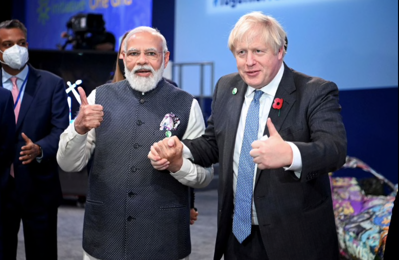 Thủ tướng Ấn Độ Narendra Modi (trái) và Thủ tướng Anh Boris Johnson trong cuộc gặp bên lề hội nghị thượng đỉnh khí hậu COP26 tại Anh vào tháng 11/2021. (Ảnh: Reuters) Thủ tướng Ấn Độ Narendra Modi (trái) và Thủ tướng Anh Boris Johnson trong cuộc gặp bên lề hội nghị thượng đỉnh khí hậu COP26 tại Anh vào tháng 11/2021. (Ảnh: Reuters)
