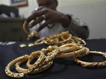 Giá vàng thế giới giảm xuống mức thấp nhất trong một tuần. Ảnh: Reuters