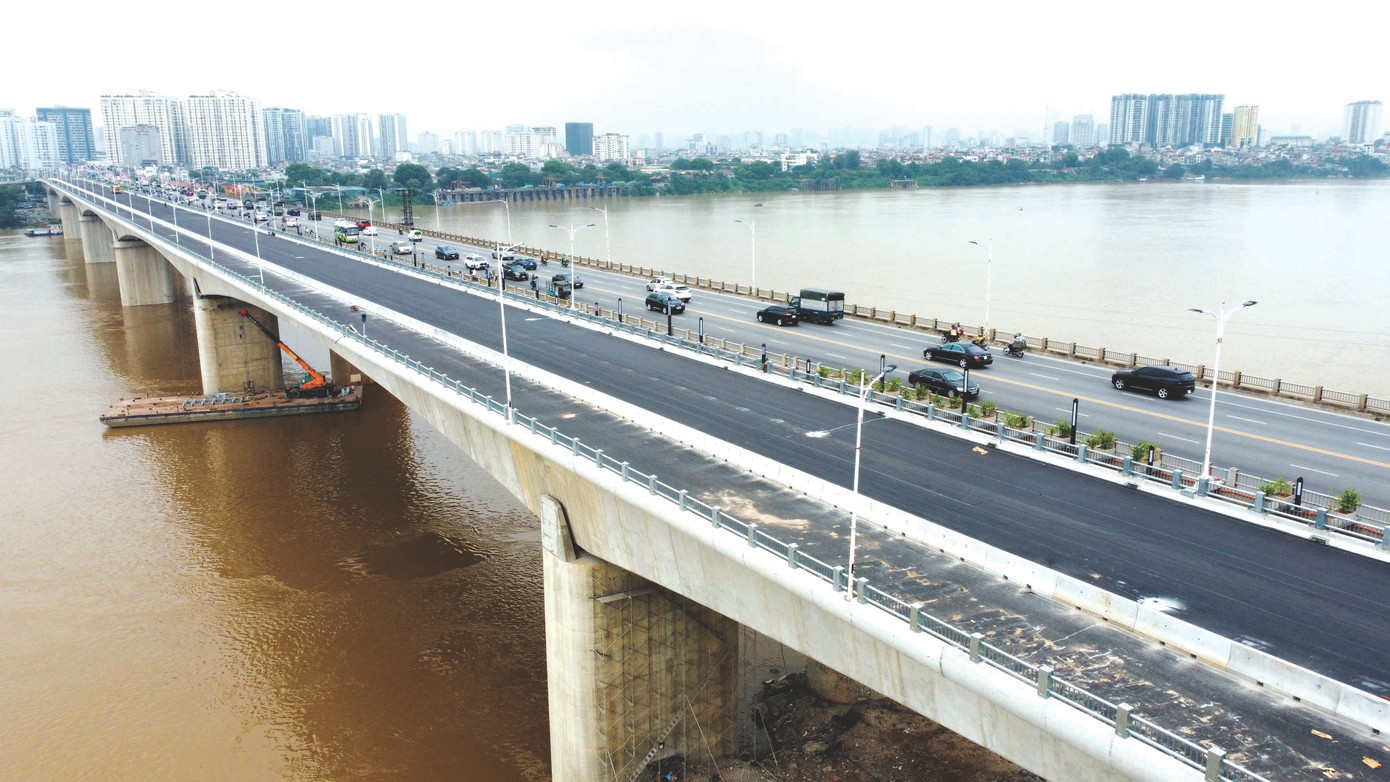 Cầu Vĩnh Tuy - một công trình đầu tư công có tiến độ giải ngân tốt và hoàn thành đúng tiến độ để giảm ùn tắc giao thông Cầu Vĩnh Tuy - một công trình đầu tư công có tiến độ giải ngân tốt và hoàn thành đúng tiến độ để giảm ùn tắc giao thông