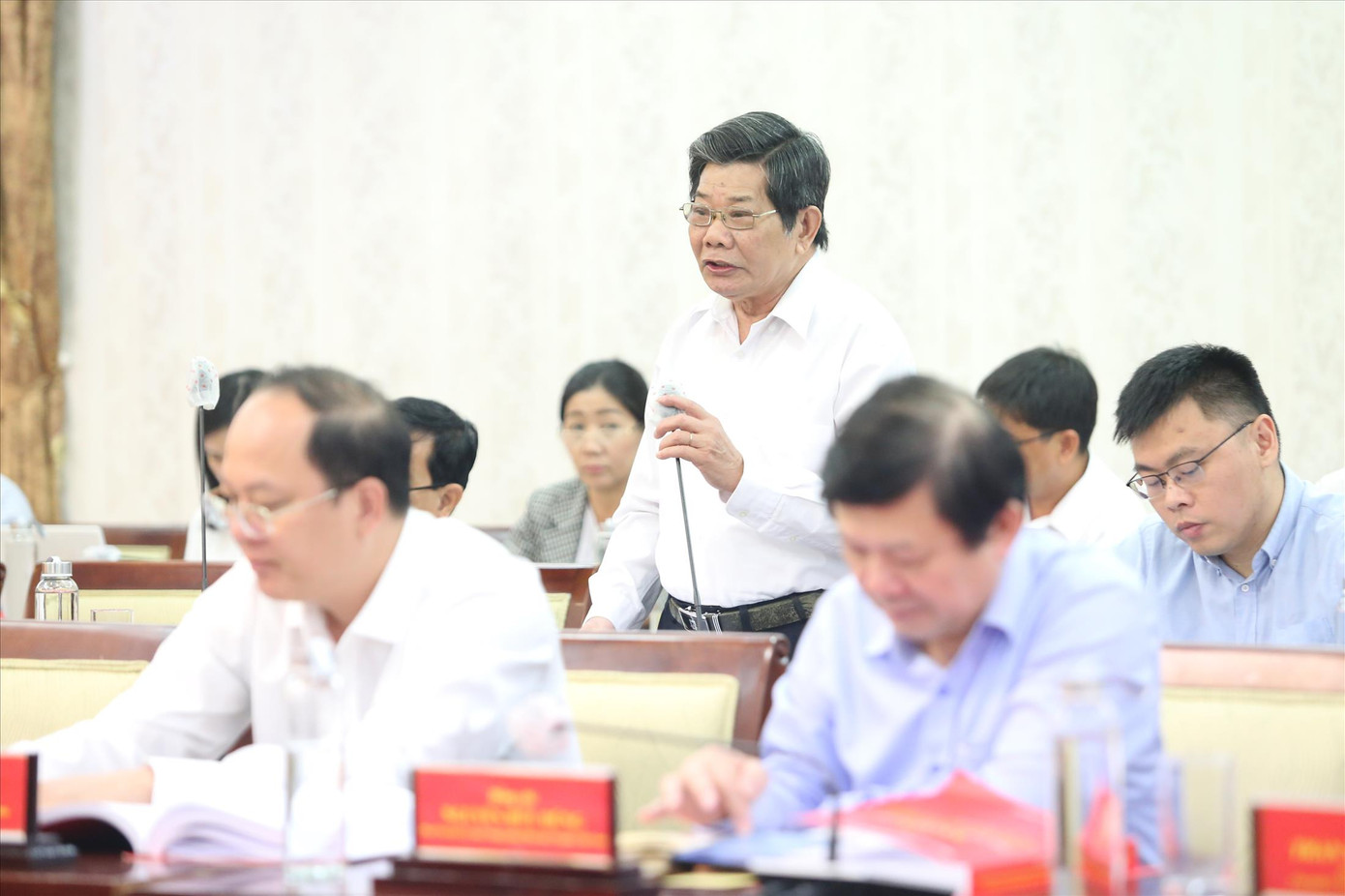 Đại biểu tham luận tại hội thảo. Ảnh: NGÔ TÙNG Đại biểu tham luận tại hội thảo. Ảnh: NGÔ TÙNG