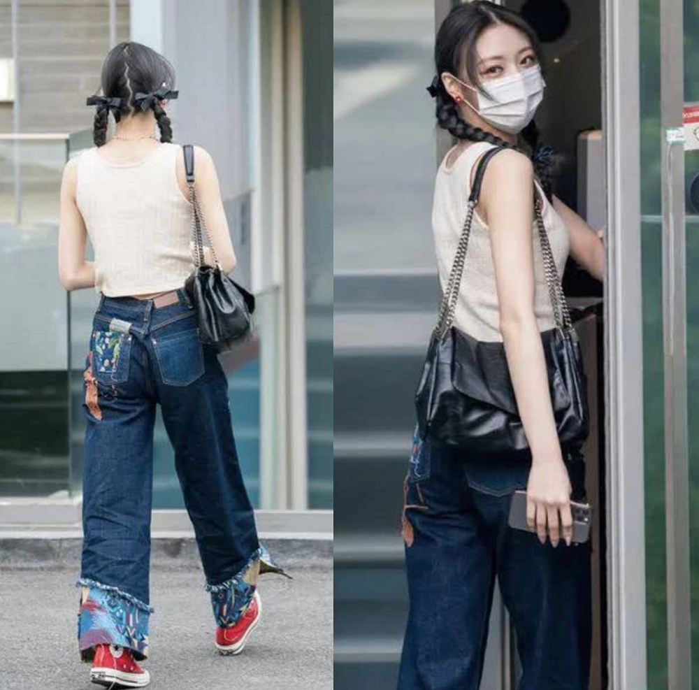 Yuna (ITZY) ứng dụng ngay “xu hướng nơ” để tạo điểm nhấn cho bộ trang phục hằng ngày.