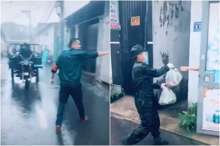 Các anh bộ đội dầm mưa để giao nhu yếu phẩm cho người dân TP.HCM. (Ảnh cắt từ clip TikTok @enny199x)