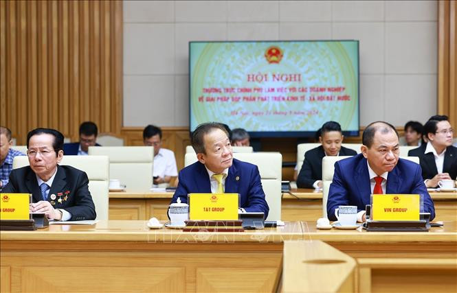 Các doanh nghiệp tư nhân lớn tham dự hội nghị. Ảnh: TTXVN.