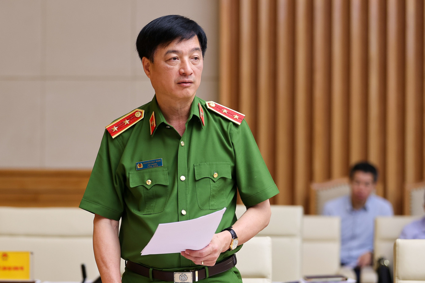 Đại biểu Bộ Công an báo cáo tại cuộc họp. Ảnh: NB