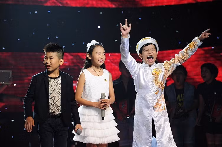 Top 3 The Voice Kids Vietnam 2013 gồm Quán quân Quang Anh - Á quân Phương Mỹ Chi - Á quân Trần Ngọc Duy.