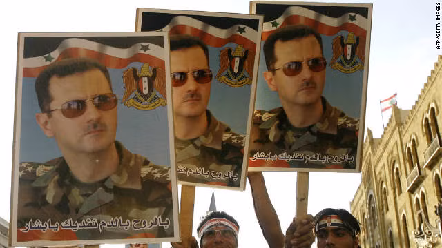 Người dân Syria đang biểu tình chống lại chế độ tổng thống Bashar Assad. Ảnh: CNN