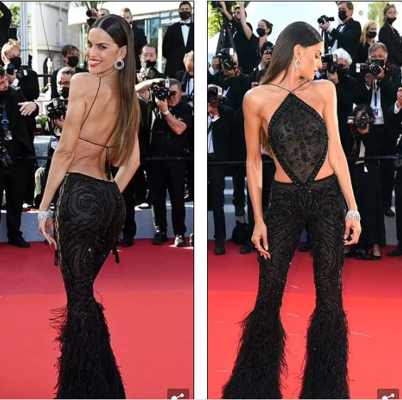 Với trang phục áo yếm "quên nội y" khoe trọn lưng trần và võng eo tuyệt đẹp, cùng quần ren lạ mắt của thương hiệu Etro, mỹ nhân sinh năm 1984 chiếm trọn spotlight trên thảm đỏ sự kiện.