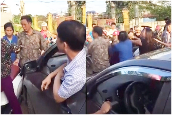 Người phụ nữ cởi áo, chửi lái xe ô tô như “tát nước” rồi xông vào đánh nhau ảnh 2