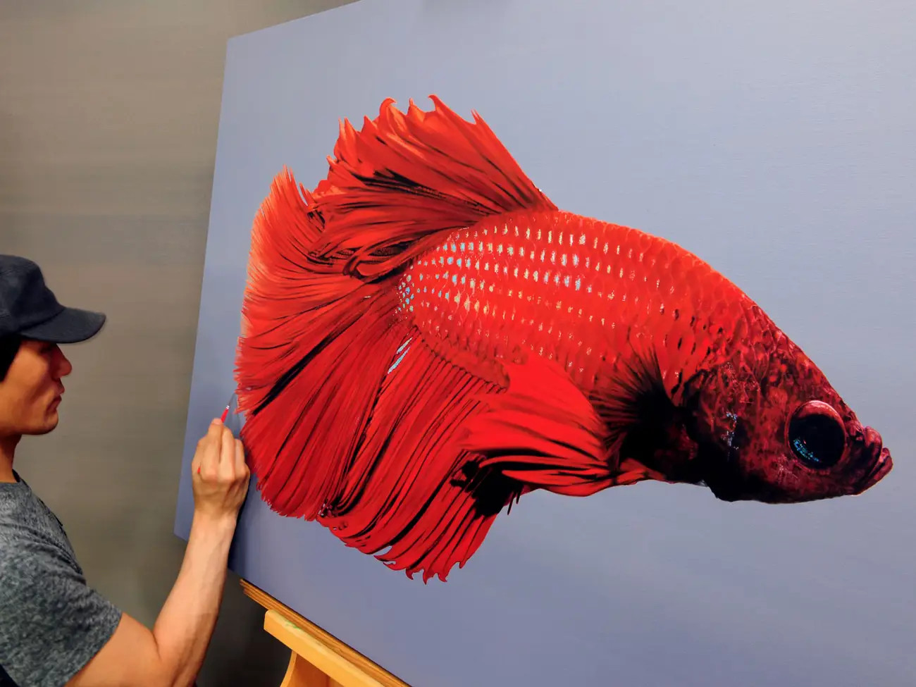 Những bức tranh thuộc trường phái cực thực khiến người xem dễ nhầm lẫn với ảnh có độ phân giải cao, nhân vật trong tranh dường như sắp chuyển động. Những bức tranh thuộc trường phái cực thực khiến người xem dễ nhầm lẫn với ảnh có độ phân giải cao, nhân vật trong tranh dường như sắp chuyển động.