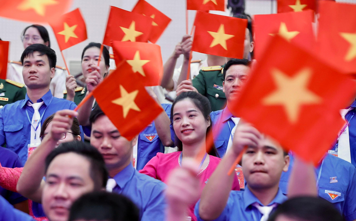 Không khí vui tươi của các đại biểu tại phiên trọng thể. Ảnh: Như Ý