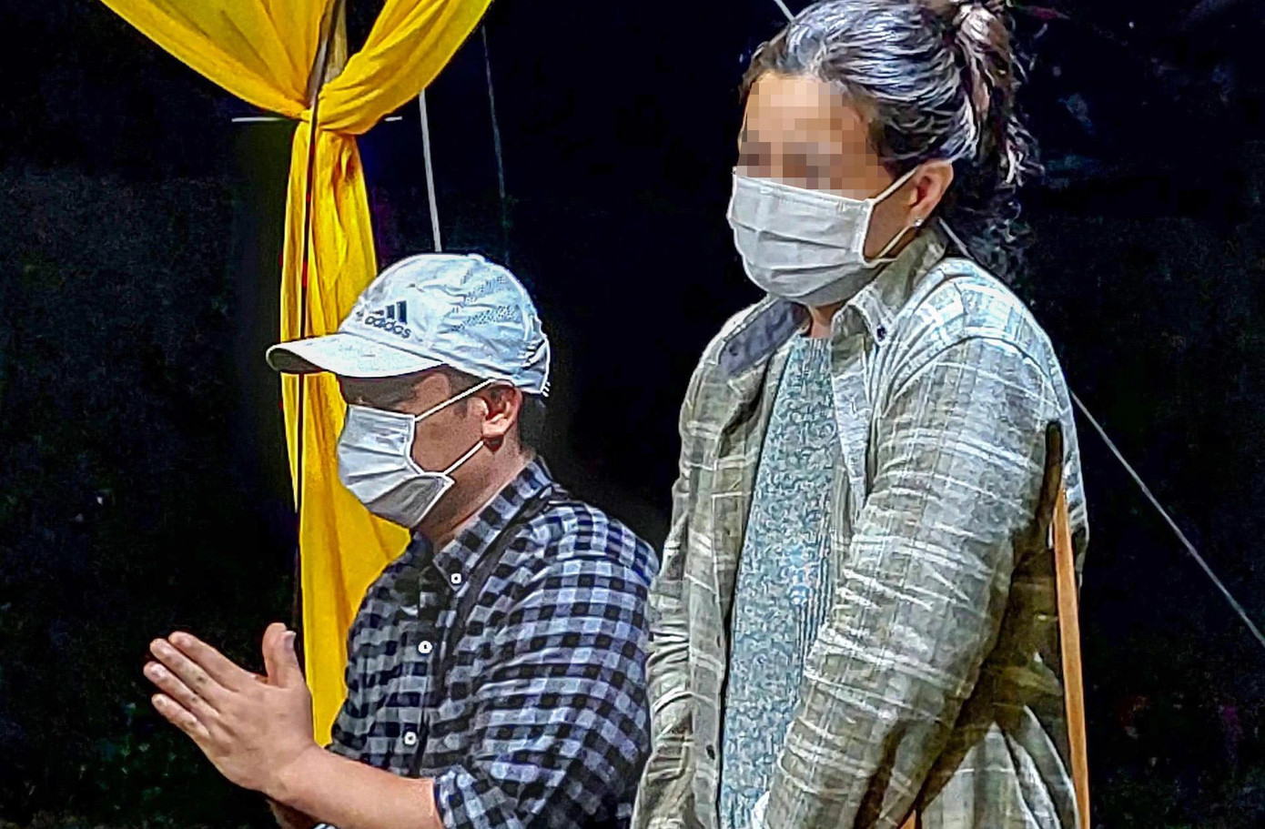 Ông Quang và bà Bích tại đám tang cháu N.L.M.Q Ông Quang và bà Bích tại đám tang cháu N.L.M.Q