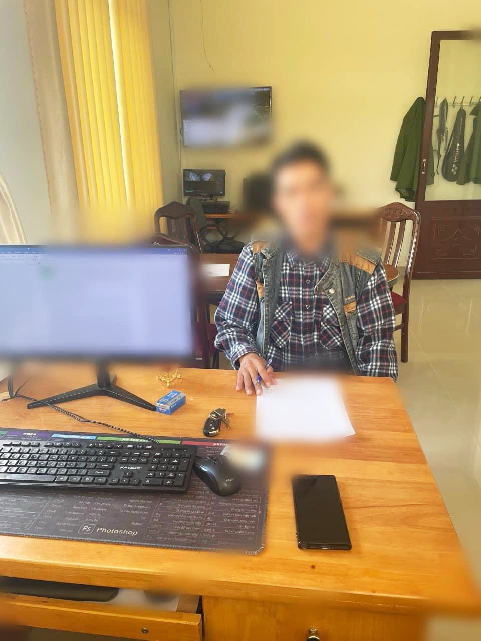 Ông H.K.V tại cơ quan công an. Ảnh: C.A