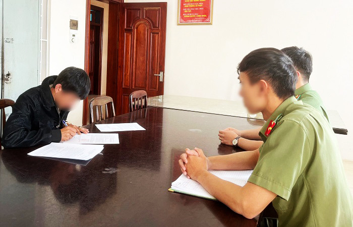 Lực lượng công an làm việc với ông T.D.T