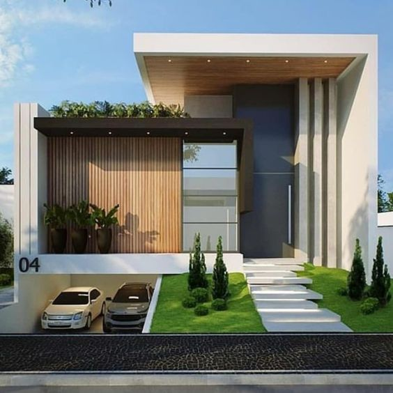 Tận dụng tầng trệt để làm hầm để xe cũng là điểm nhấn cho ngôi nhà 1 tầng hiện đại này. Phần lửng lát thêm cỏ và đá làm bậc thang. Sử dụng gỗ lát làm tấm chắn mặt tiền, thiết kế kiểu xếp tạo sự sang trọng, hiện đại cho ngôi nhà.