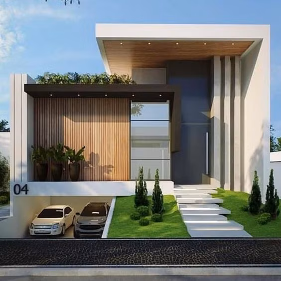 Tận dụng tầng trệt để làm hầm để xe cũng là điểm nhấn cho ngôi nhà 1 tầng hiện đại này. Phần lửng lát thêm cỏ và đá làm bậc thang. Sử dụng gỗ lát làm tấm chắn mặt tiền, thiết kế kiểu xếp tạo sự sang trọng, hiện đại cho ngôi nhà.