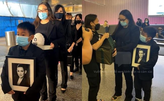 Cháu ngoại ngơ ngác cầm di ảnh cố ca sĩ Phi Nhung. Cháu ngoại ngơ ngác cầm di ảnh cố ca sĩ Phi Nhung.