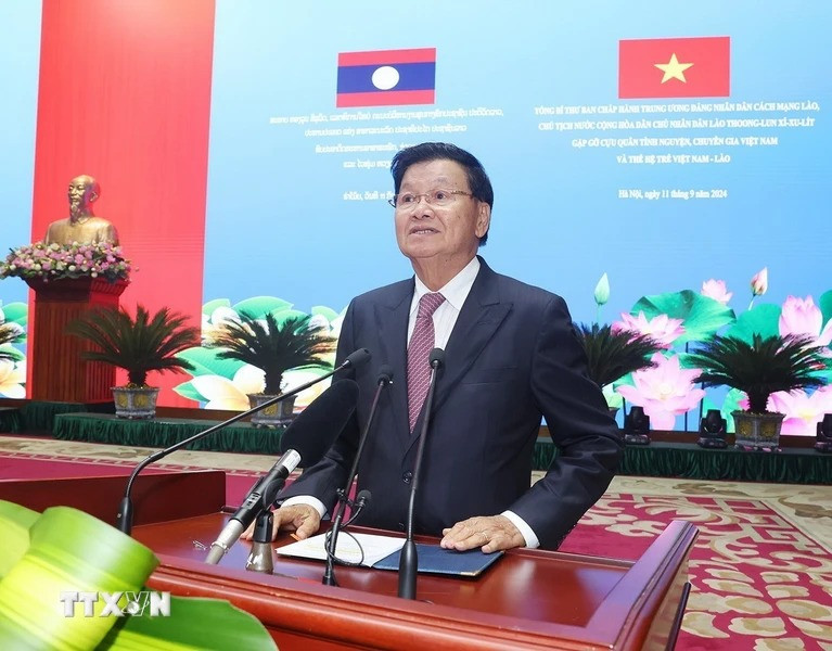 Tổng Bí thư, Chủ tịch nước Lào Thongloun Sisoulith phát biểu tại cuộc gặp. (Ảnh: Trí Dũng/TTXVN)