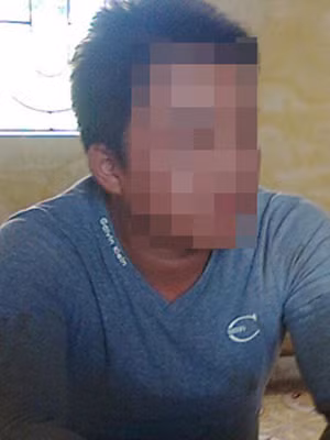 Nghi can Vũ Văn Q. tại trụ sở công an