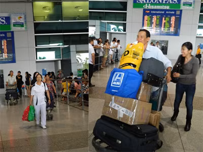 300 hành khách cuối cùng về tới sân bay Tân Sơn Nhất trong bộ dạng mệt mỏi. ảnh: Gia Huy